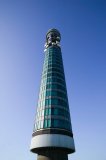 full length view of BT telecom tower in central london against a blue sky