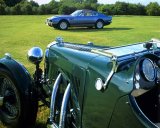 Transport: Austin Martin Le Mans (1934) in foreground and Aston Martin Lagonda (1981) in background 
