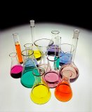 Chemical flasks and coloured liquids.