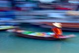 Lady Paddling Boat at Damnoen Saduak Floating Market -Thailand