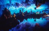 Lake, stalactites and stalagmites inside Reed Flute Cave; Guilin, Guangxi province, southwest China.
