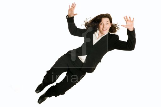 business woman jumping high in the air to celebrate success