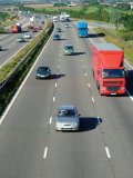 Traffic on UK motorway: drive road motorway freeway lanes driving cars lorries vehicles direction travel business holiday leisure vacation services speed danger trucks transport transportation motion speed distribution couriers fast congestion traffic...