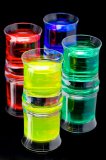 Colourful fantasy drinks in shot glasses