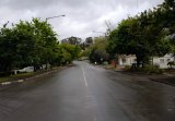 Swellen Grebel Street, Swellendam, Overberg,Western Cape, South Africa; view of typical african town street on wet grey day.