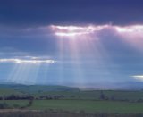 light rays through overcast sky
