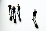 models of businessmen in group viewed from above