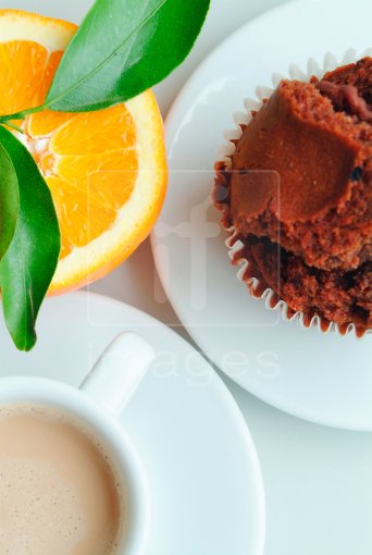 Orange, coffee and muffin