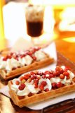 Waffles with whipped cream and wild stawberries. Szczawnica Spa. Poland