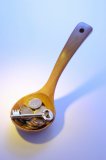 Ladle with Key and Coins