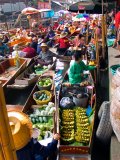 Traders at Damnoen Saduak Floating Market, Bangkok.