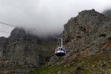 View of cable car disapearing into the mist as it ascends Table Mountain, Cape Town, Western Cape, South Africa.