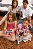 Portrait of a family enjoying technology