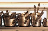 Stacks of chefs pans in restaurant kitchen